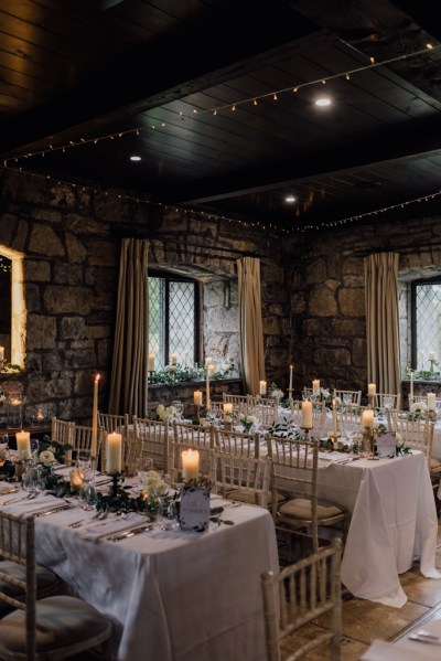 Empty dining room for guests table chairs candles