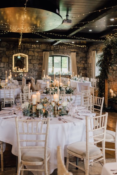 Empty dining room for guests table chairs candles