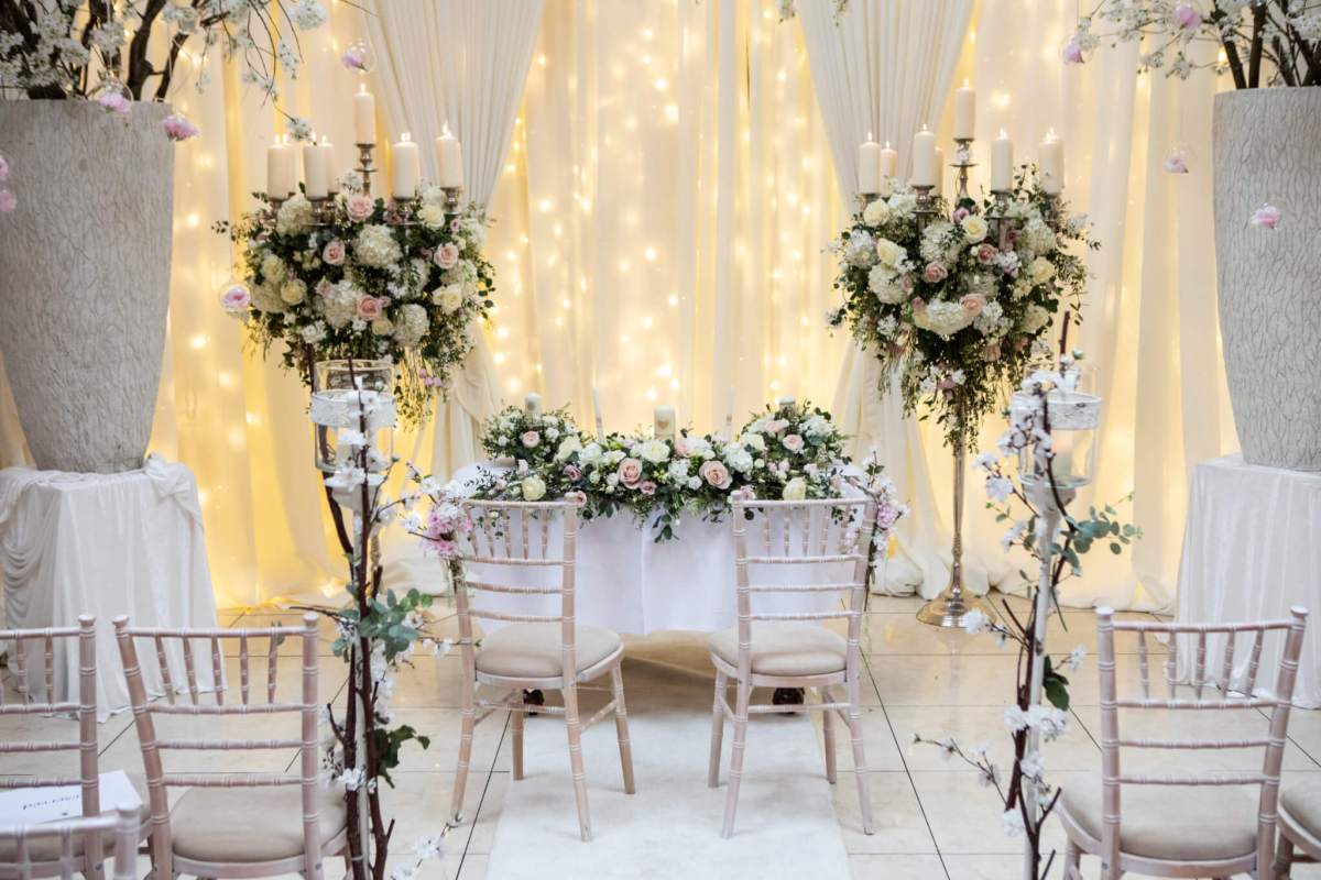 Irish castle weddings Kilronan Castle ceremony space flowers