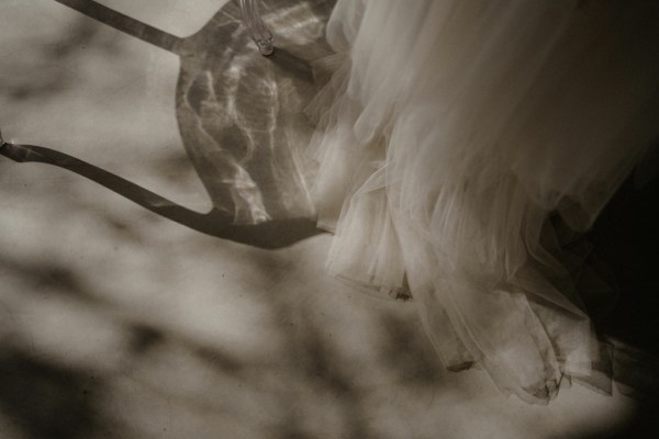 Ruffle chair shadow detail bridal gown sunshine reflection