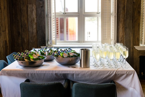 Champagne Peroni beer bottle details buckets and prosecco on table