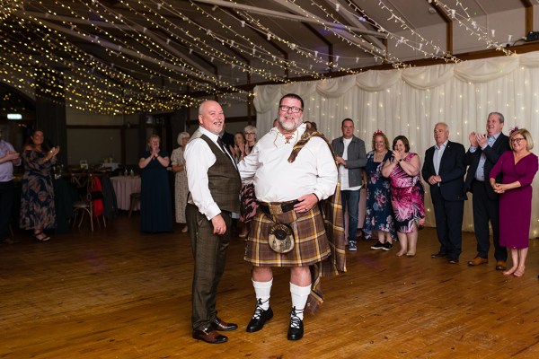 Husbands on the dancefloor kilt