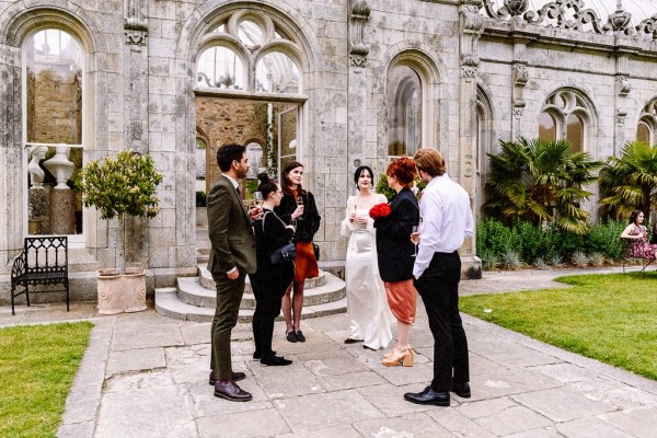 Bride with guests outside church setting