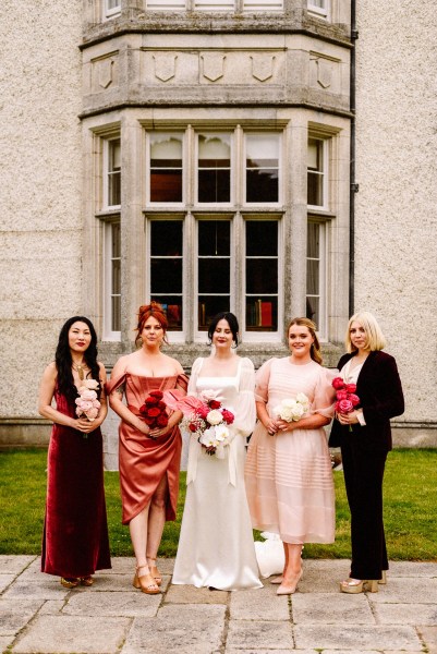 Bride bridesmaids mother exterior shot wedding venue