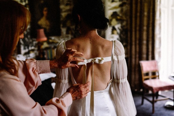 Back of brides dress getting ready bow detail