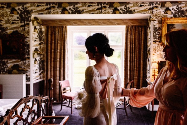 Back of brides dress getting ready bow detail