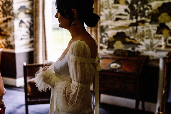 Bride getting ready frill detail on dress