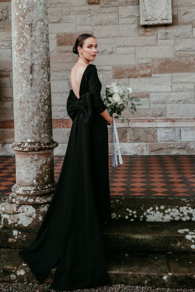 Bridesmaid Back of dress detail neckline black pillar flowers