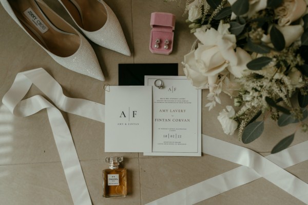 A + F initials RSVP invitation letter and earring detail perfume flowers and Jimmy Choo bridal heels