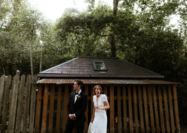 Couple outside house/forest setting