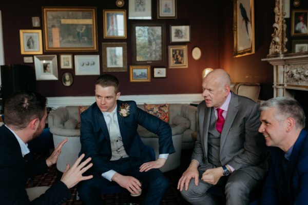 Groom groomsmen/friends sitting on couch