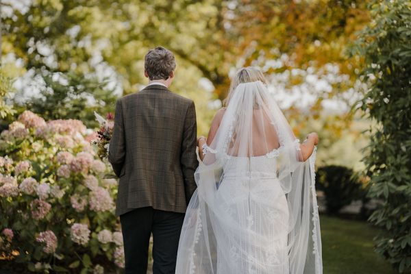 Bride and groom from behind