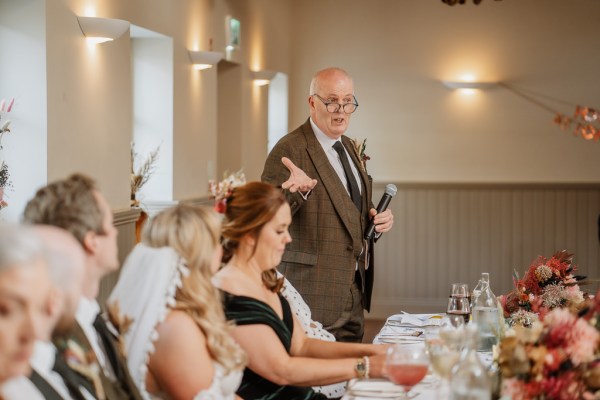 Father gives speech to bride and groom couple