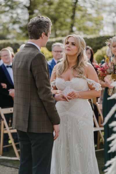 Bride reads her vows to groom