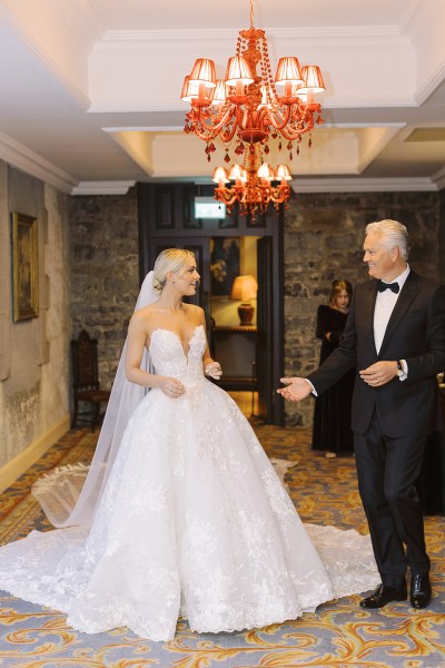 Father of the bride standing interior shot