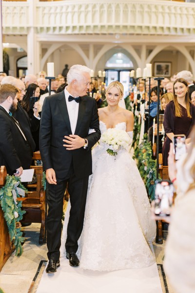 Father walks daughter bride down the aisle