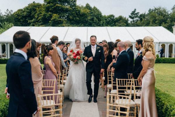 Father of the bride walks down the aisle