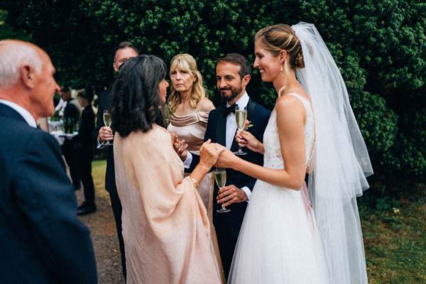 Bride chats and talks to guests