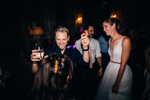 Bride groom and guests on the dancefloor