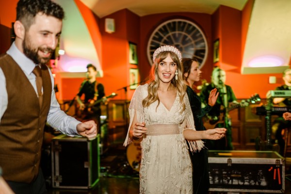 Bride dancing smiling celebrating