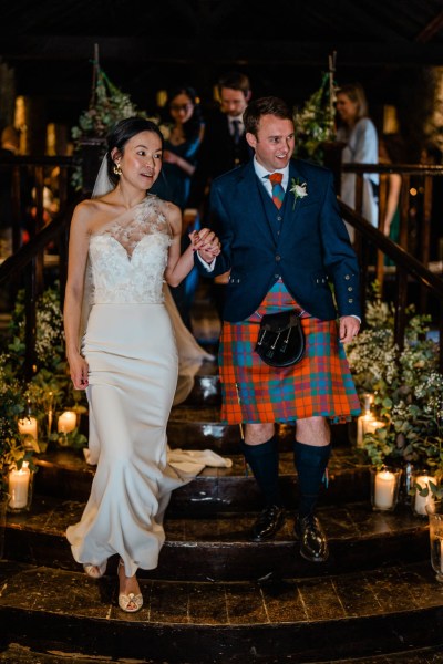 Bride and groom celebrate marriage at alter