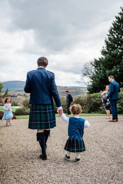 Man in kilt and little girl wearing kilt