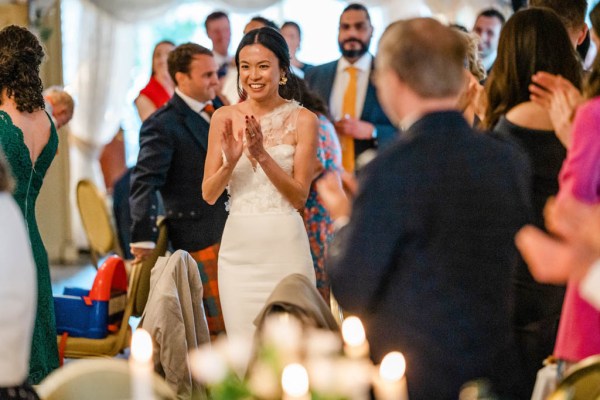 Bride claps during speeches