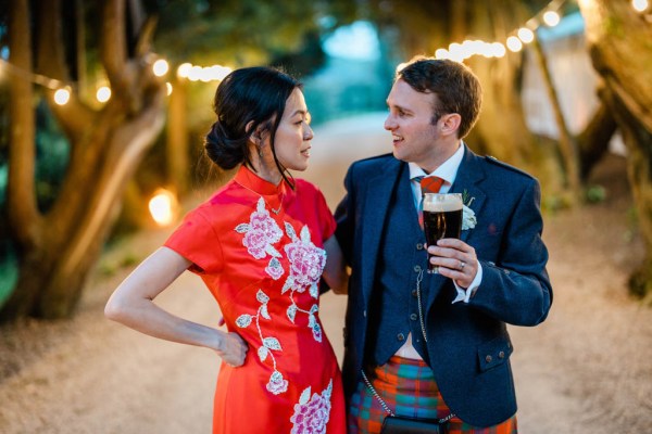 Groom drinks Guinness chatting to bride