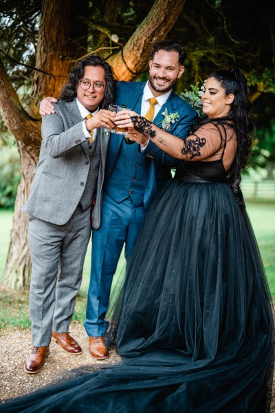 Bride groom and friend guest cheers with shots