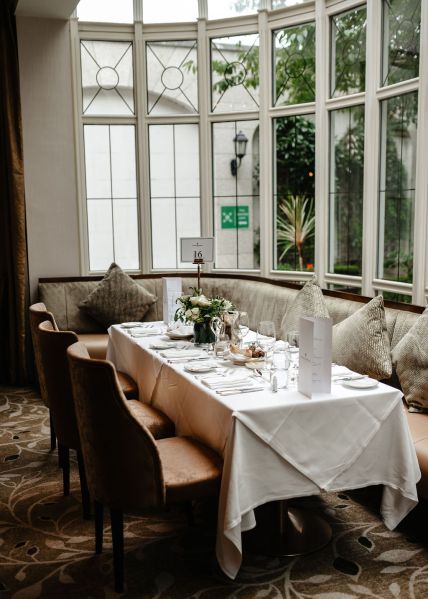 Empty dining room ballroom setting large windows