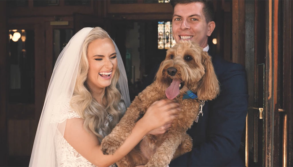 bride and groom with dog