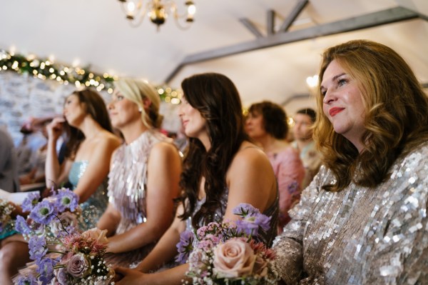 Guests react to bride and groom