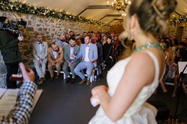 Bride looking at audience smiling