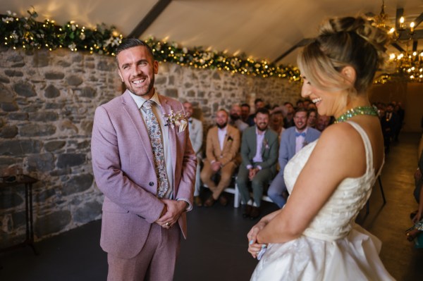 Bride and groom at alter during ceremony