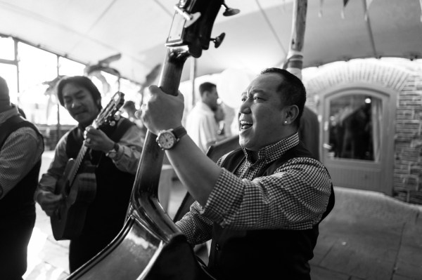 Black and white image of cello man musician