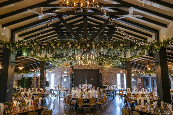 Empty dining room ballroom flowers candles and lights