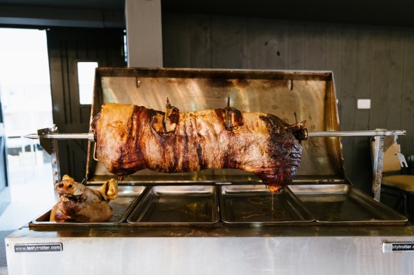 Meat being cooked for guests spitroast