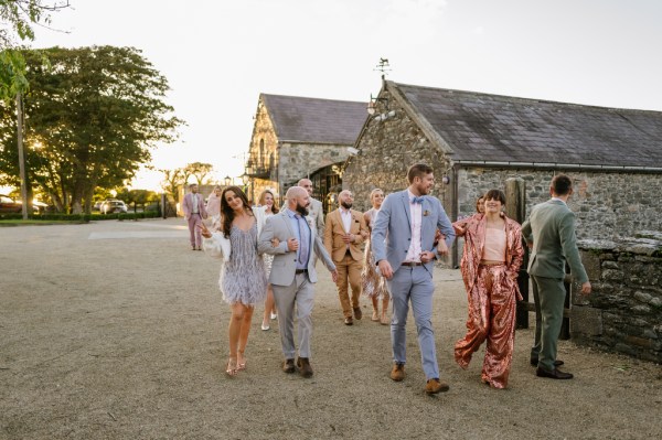 Atmosphere shot of guests walking towards venue