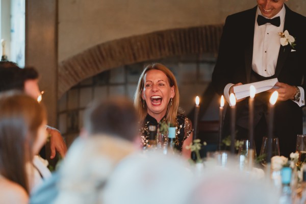 Woman laughs during speeches