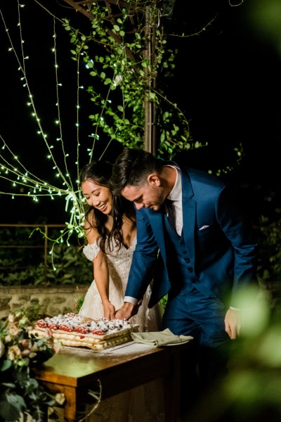 Bride and groom cutting the cake