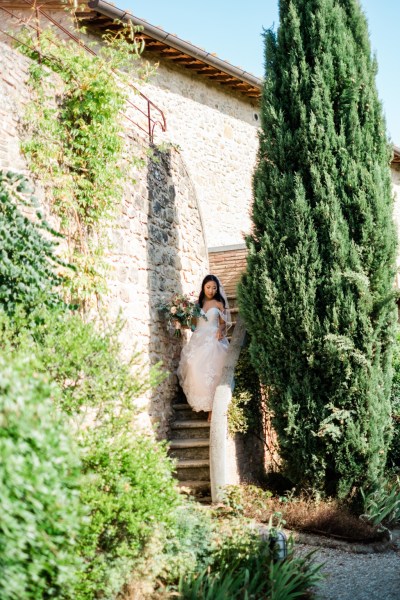 Bride walks down the steps