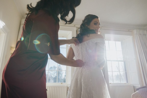 Back of brides dress getting ready