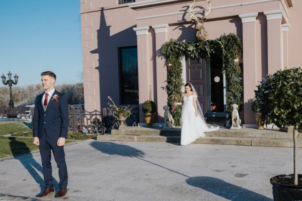 Bride exiting wedding venue