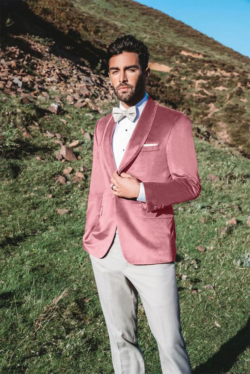 grooms in pink suits