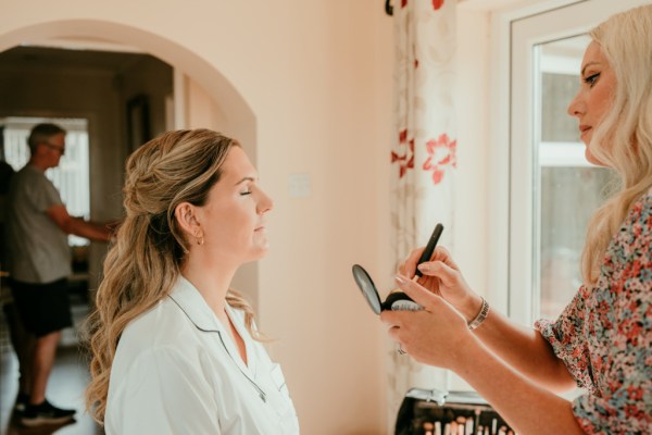 Bride gets her makeup done MUA