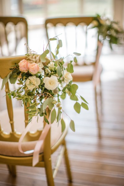 Flowers on chair bouquet roses