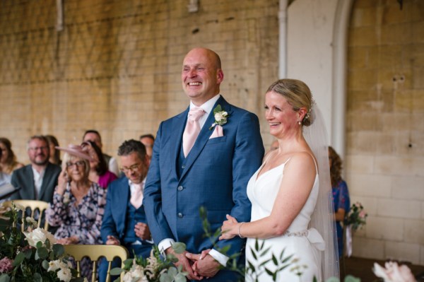 Bride and groom during their wedding ceremony at alter