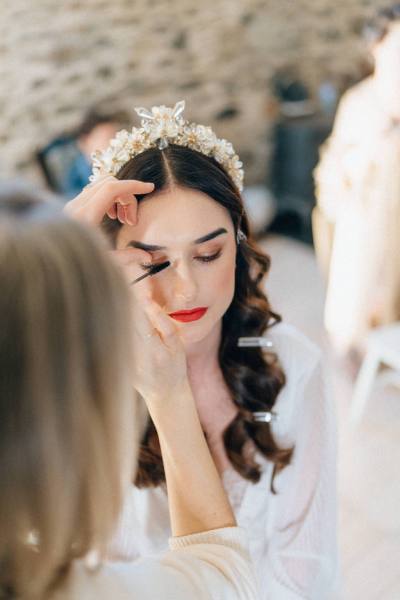 Bride getting her makeup done by MUA eyeshadow