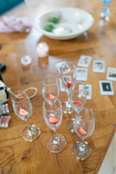 Champagne glasses with strawberries inside