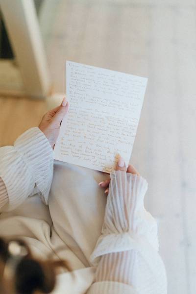 Bride reads letter from groom